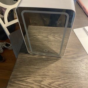 mini heating/cooling skincare fridge